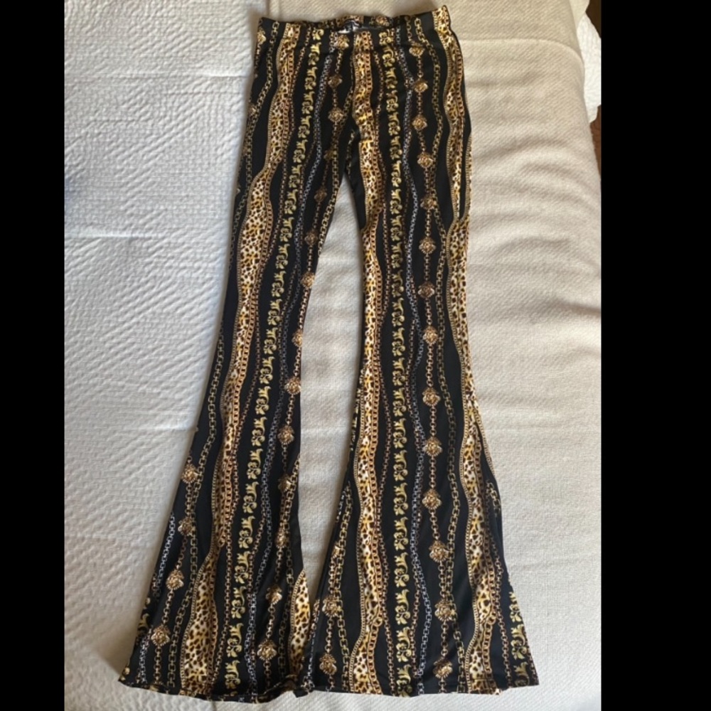 FashionNova Black Bell-Bottom Pants. Size: Medium. Color: Black.